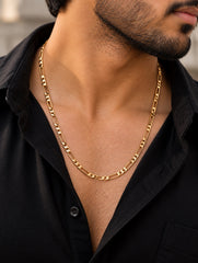 Stylish stainless steel gold chain worn by a man in a black shirt